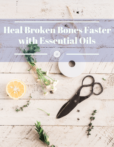 Heal broken bones faster with essential oils" inscribed over a backdrop featuring herbal plants, a lemon half, and scissors on a rustic wooden surface.